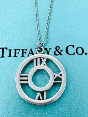Authentic Tiffany & Co. Atlas Open Circle Pendant Necklace.